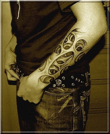 arm tribal tattoo pictures. pictur design tribal tattoo