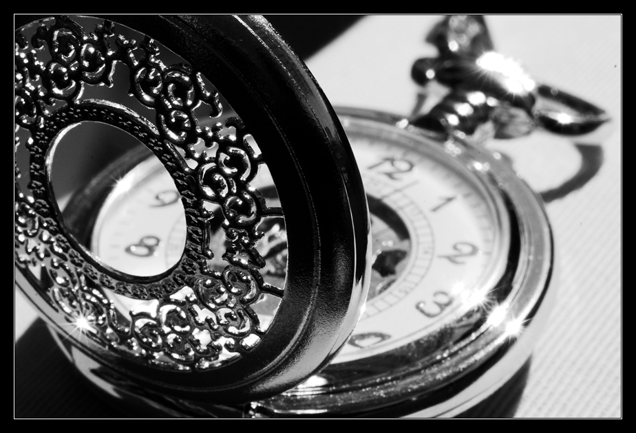 Black and white pocket watch by ClawzSkunk